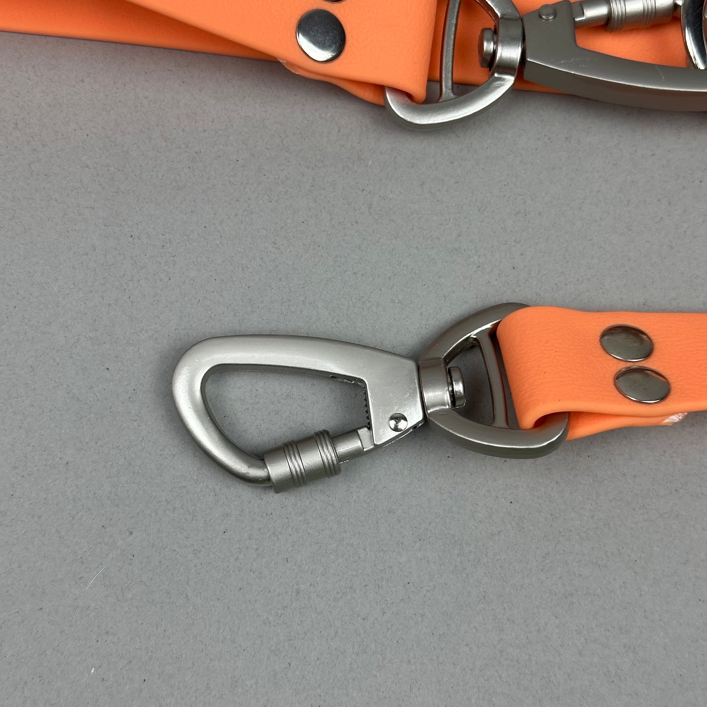 Traílla doble función Impermeable Naranja