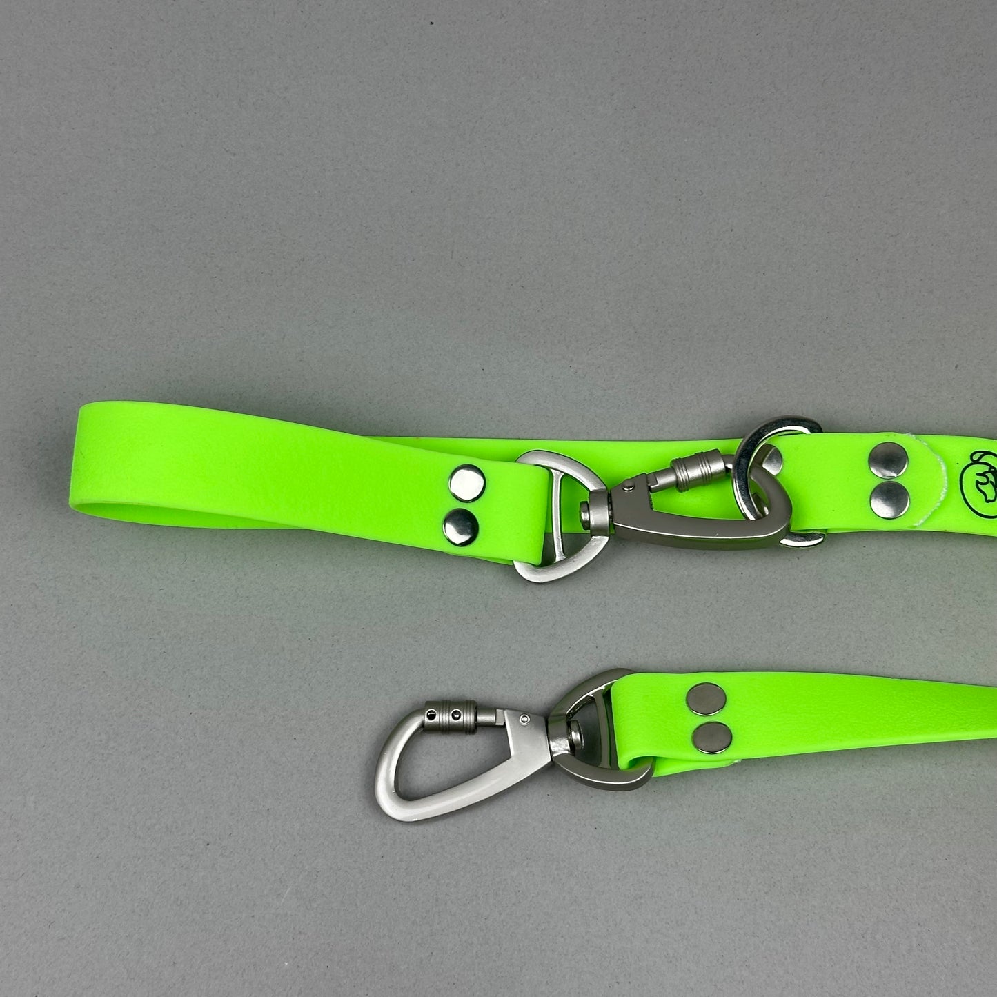 Traílla doble función Impermeable Verde neón