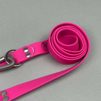 Traílla doble función Impermeable Fucsia