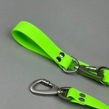 Traílla doble función Impermeable Verde neón