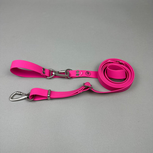 Traílla multipropósito impermeable Fucsia