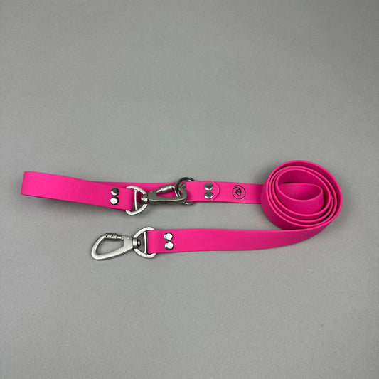 Traílla doble función Impermeable Fucsia