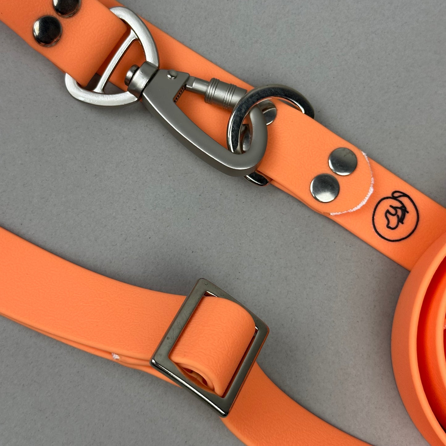 Traílla multipropósito impermeable Naranja