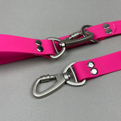 Traílla doble función Impermeable Fucsia
