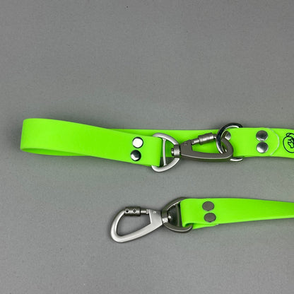 Traílla doble función Impermeable Verde neón