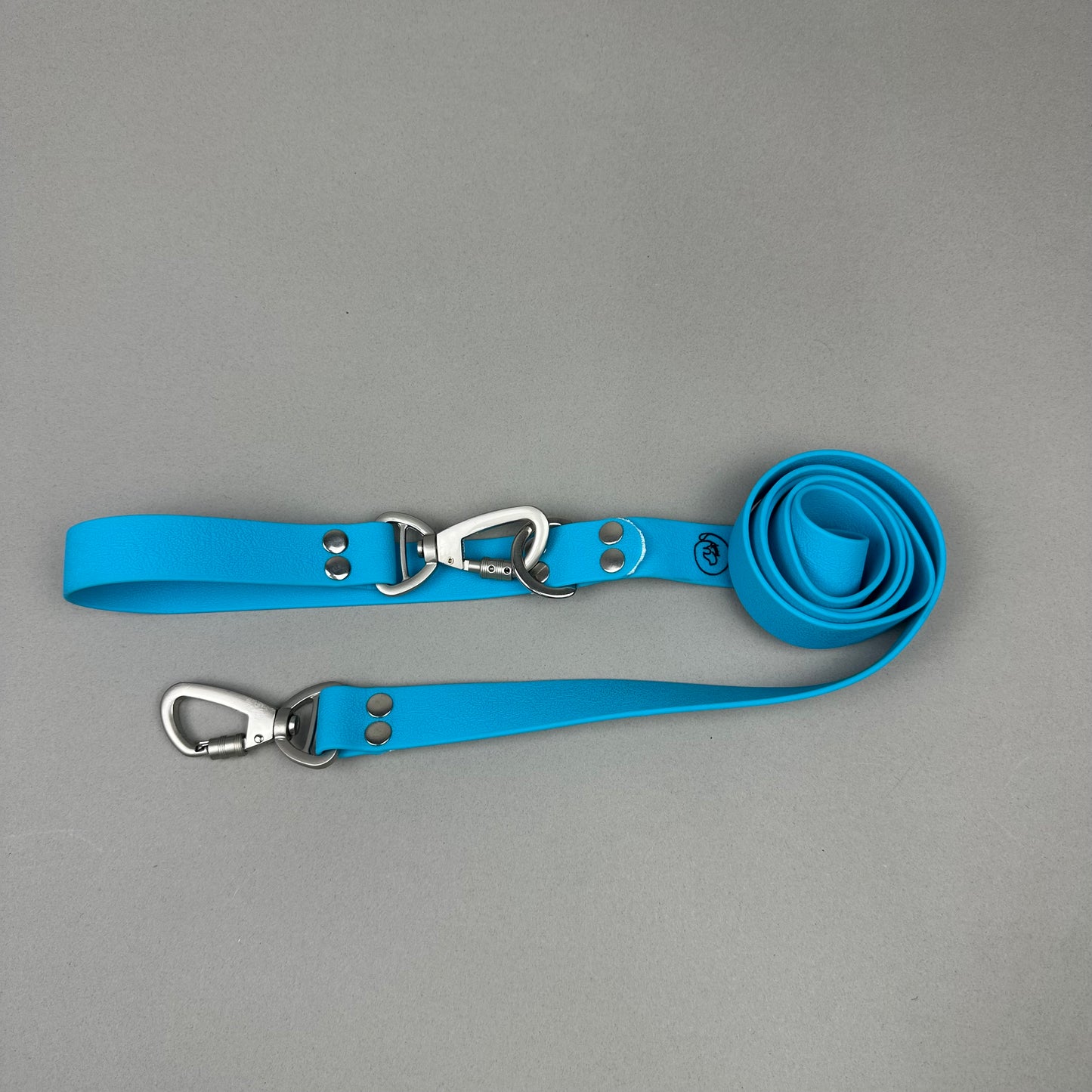 Traílla doble función Impermeable Celeste