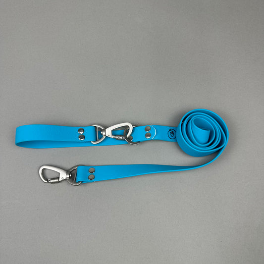 Traílla doble función Impermeable Celeste