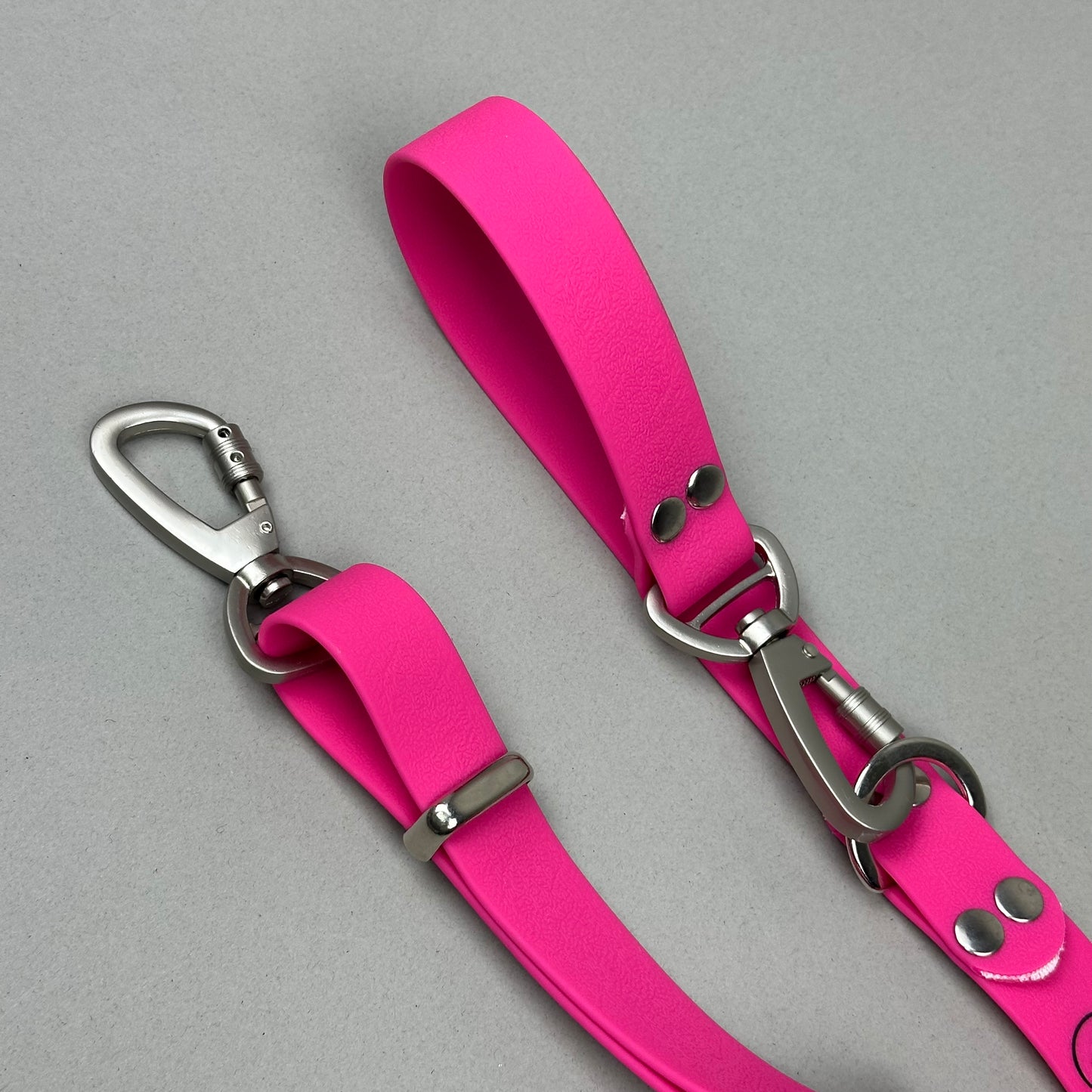 Traílla multipropósito impermeable Fucsia