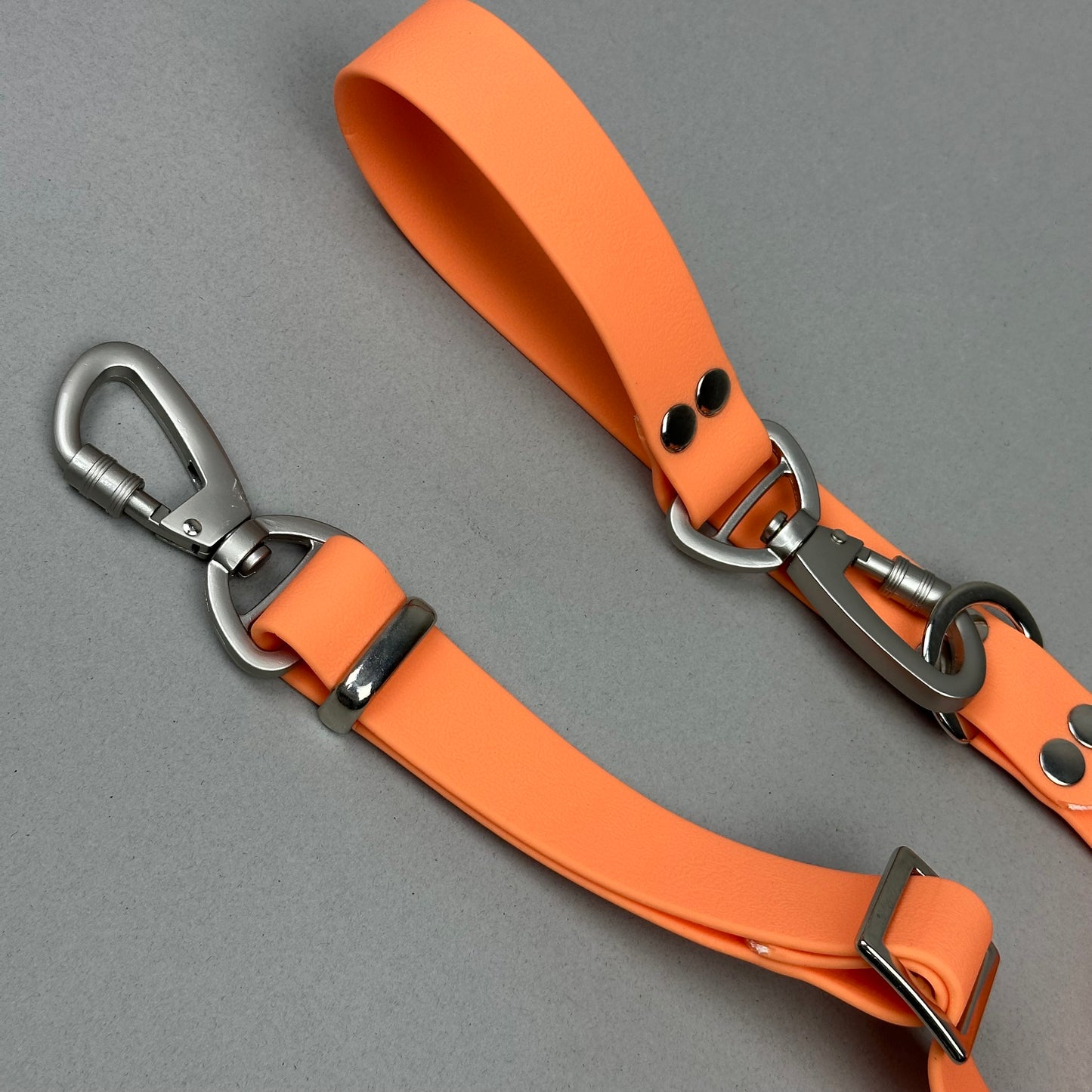 Traílla multipropósito impermeable Naranja