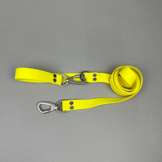 Traílla doble función Impermeable Amarillo claro