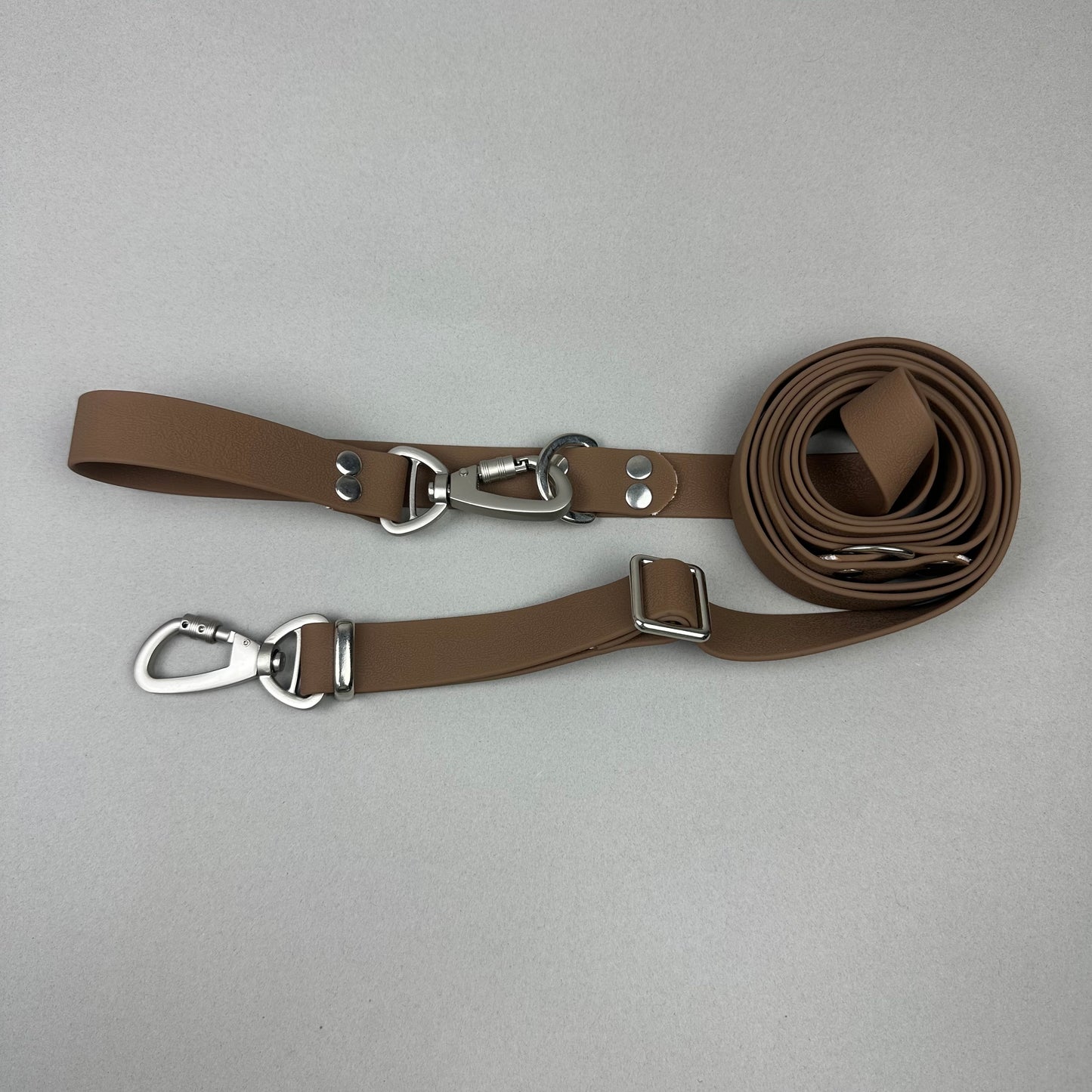 Traílla multipropósito impermeable Café