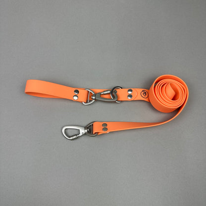 Traílla doble función Impermeable Naranja