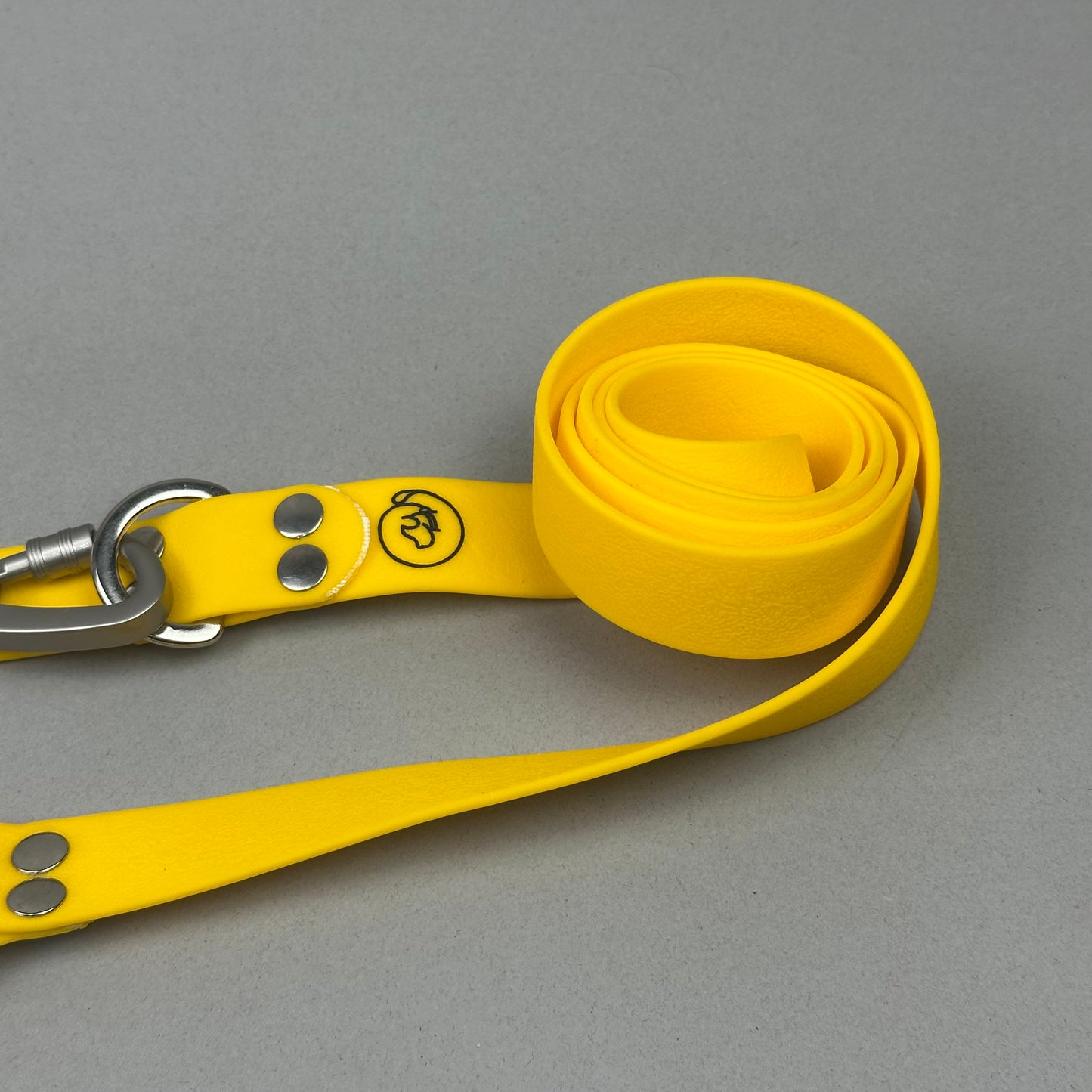 Traílla doble función Impermeable amarillo