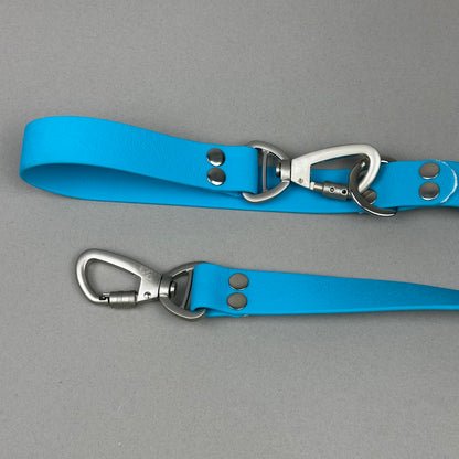 Traílla doble función Impermeable Celeste