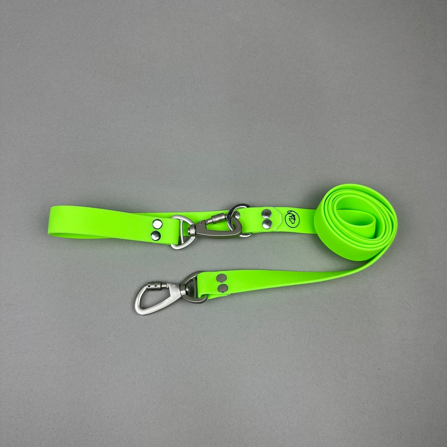 Traílla doble función Impermeable Verde neón