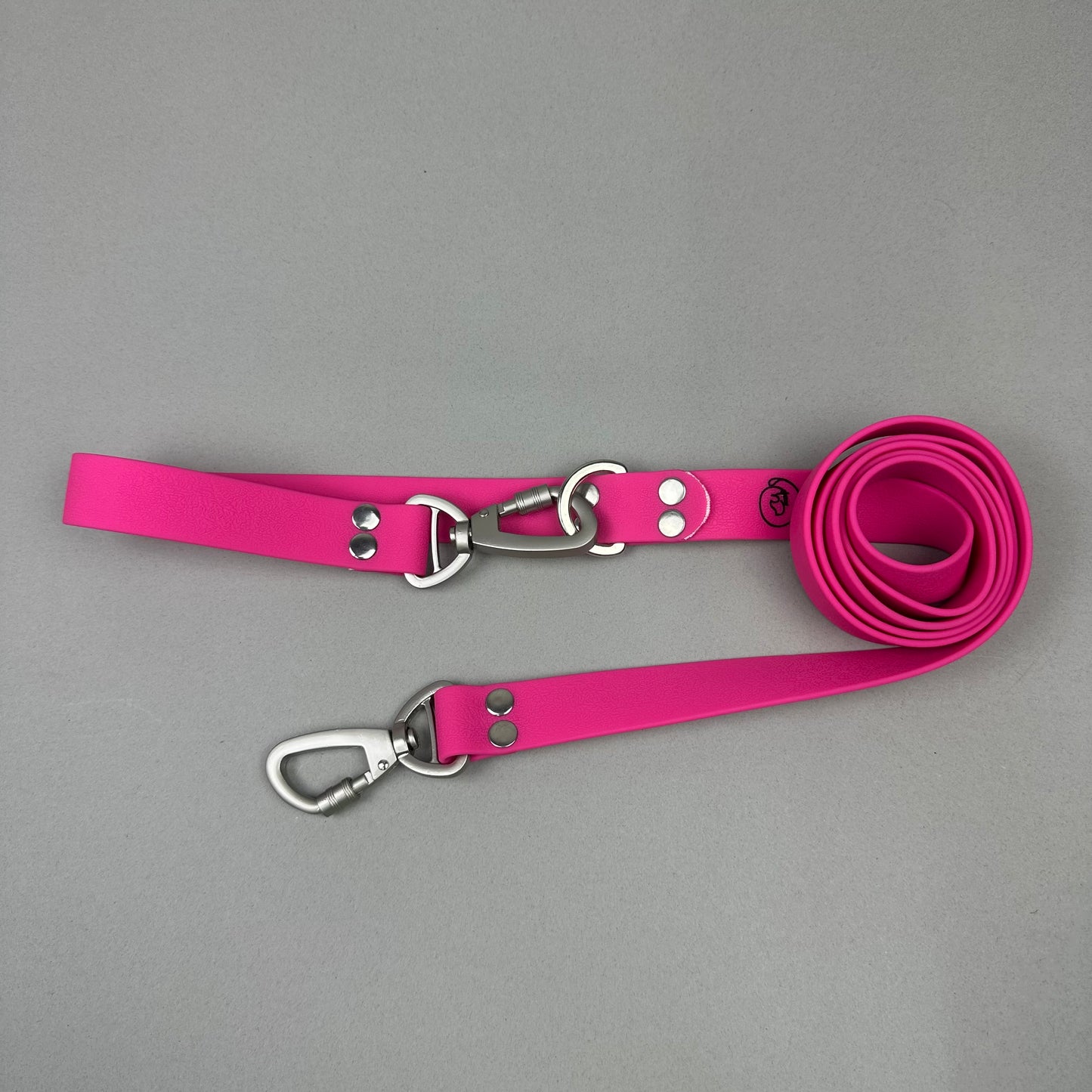 Traílla doble función Impermeable Fucsia