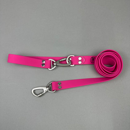 Traílla doble función Impermeable Fucsia