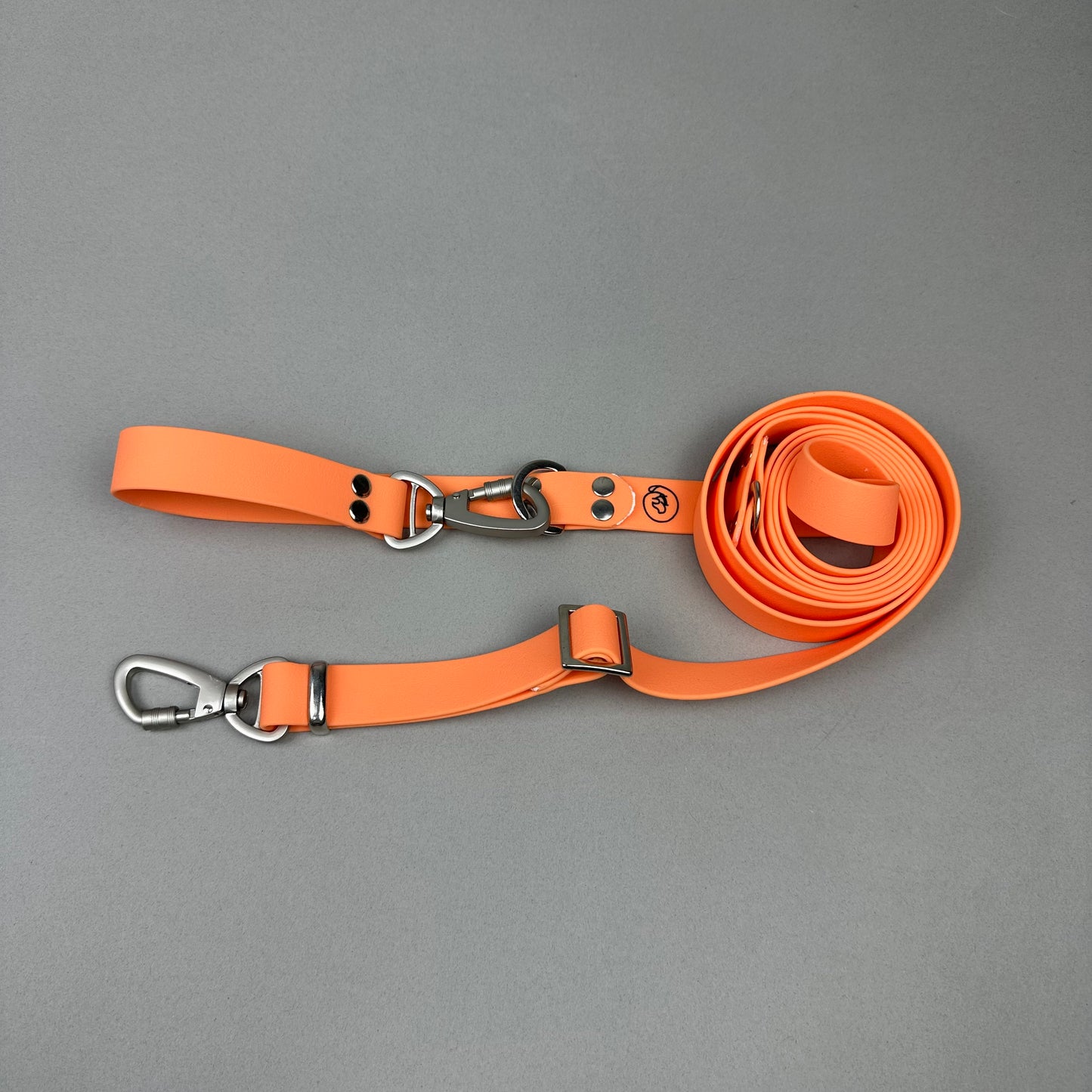 Traílla multipropósito impermeable Naranja