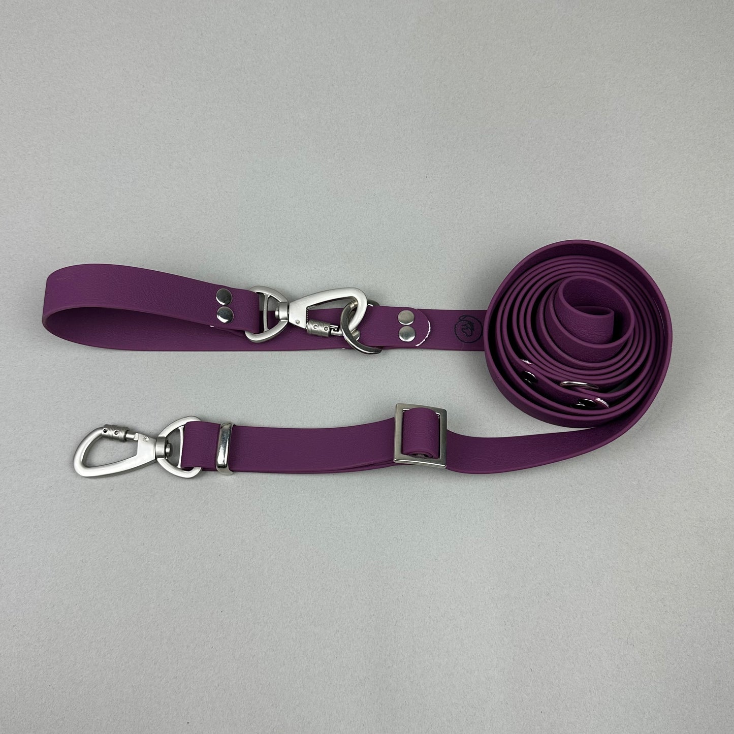 Traílla multipropósito impermeable Morado