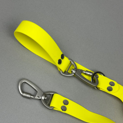 Traílla doble función Impermeable Amarillo claro