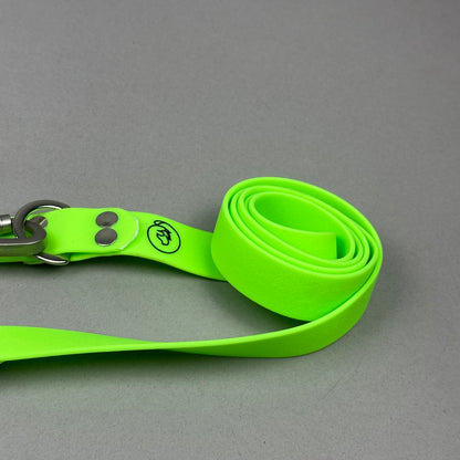 Traílla doble función Impermeable Verde neón
