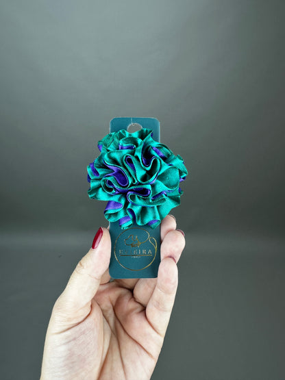 Flor pequeña morado/aguamarina
