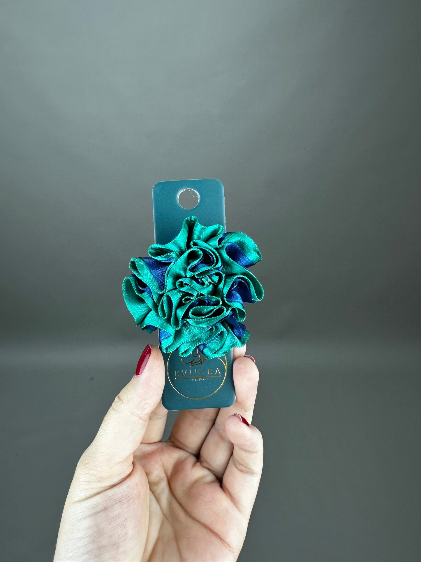 Flor pequeña aguamarina/azul oscuro