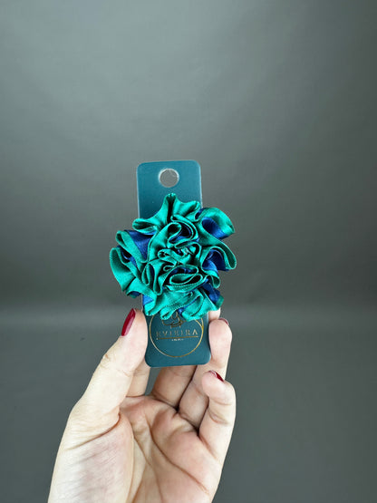 Flor pequeña aguamarina/azul oscuro